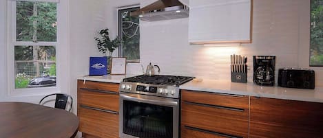 Coffee/tea maker, fridge, microwave, oven