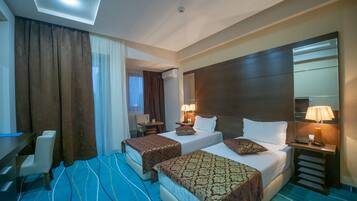 Standard Double Room | Minibar, in-room safe, individually decorated, individually furnished