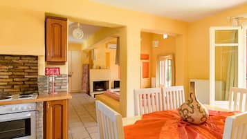 Luxury Villa | Private kitchen | Full-size fridge, microwave, oven, stovetop