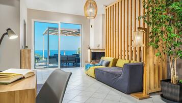 Luxury Villa | Living area | 55-inch flat-screen TV with digital channels, TV, fireplace