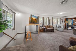 Smart TV, fireplace, video games, foosball
