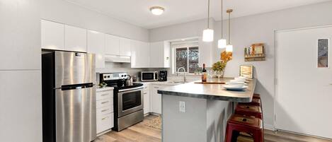 Condo, Multiple Beds (220 Peterson St. (Unit 7)) | Private kitchen | Coffee/tea maker, electric kettle, cookware/dishes/utensils