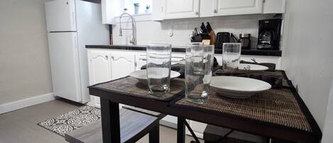 Apartment, Multiple Beds (915 23rd St. - Lower) | Private kitchen | Full-size fridge, oven, stovetop, coffee/tea maker