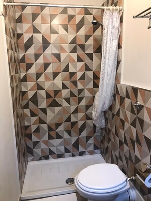 Hair dryer, towels, soap, shampoo