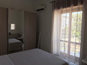 2 bedrooms, in-room safe, iron/ironing board, WiFi