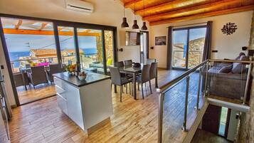 Villa, 3 Bedrooms, Smoking, Balcony | Private kitchen | Stovetop, coffee/tea maker, electric kettle, high chair