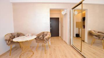 Studio, City View | Dining room
