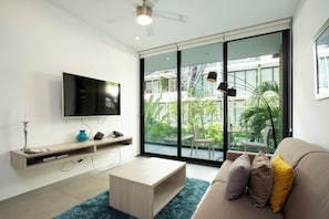 Departamento, 1 habitación, balcón, vista a la ciudad | Área de sala de estar