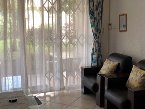 Apartment, 2 Bedrooms, Accessible, Smoking | Living room | Books - Lovely Apartment in Flic en Flac, Close to the Lovely Beach and all Amenities (Flic-en-Flac)