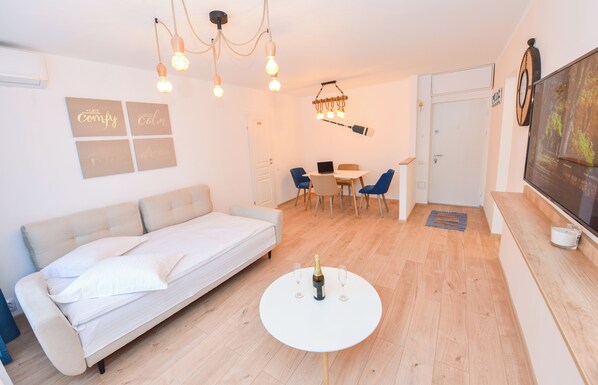 Appartement, 1 chambre, vue sur la ville | Salle de séjour