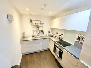 Microwave, coffee/tea maker, electric kettle, dining tables
