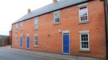 Apartment, 1 Bedroom, Refrigerator | Property entrance