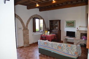 Apartment, 2 Bedrooms, Smoking, Patio | Living area | TV - Apartment With Private Garden in Tuscany (Asciano)