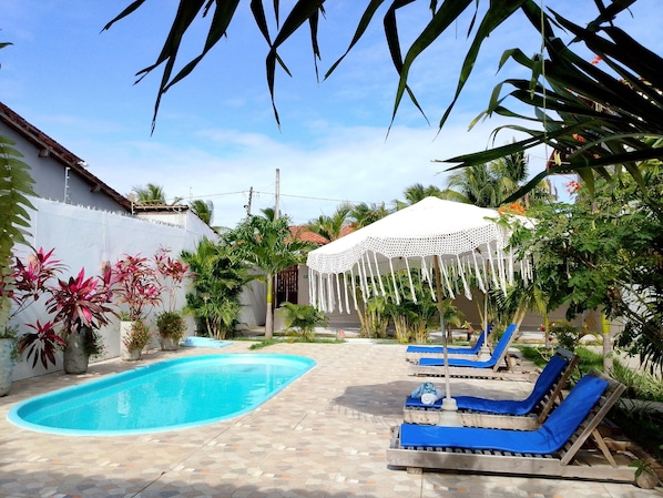 Outdoor pool, open 9:00 AM to 7:00 PM, sun loungers