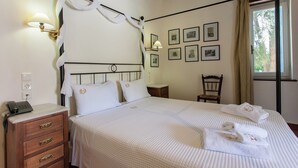 Apartment, 1 Bedroom, Balcony, Garden View | 2 bedrooms - Dine on the Generous Veranda at a Rustic Stone Getaway (Platanias)
