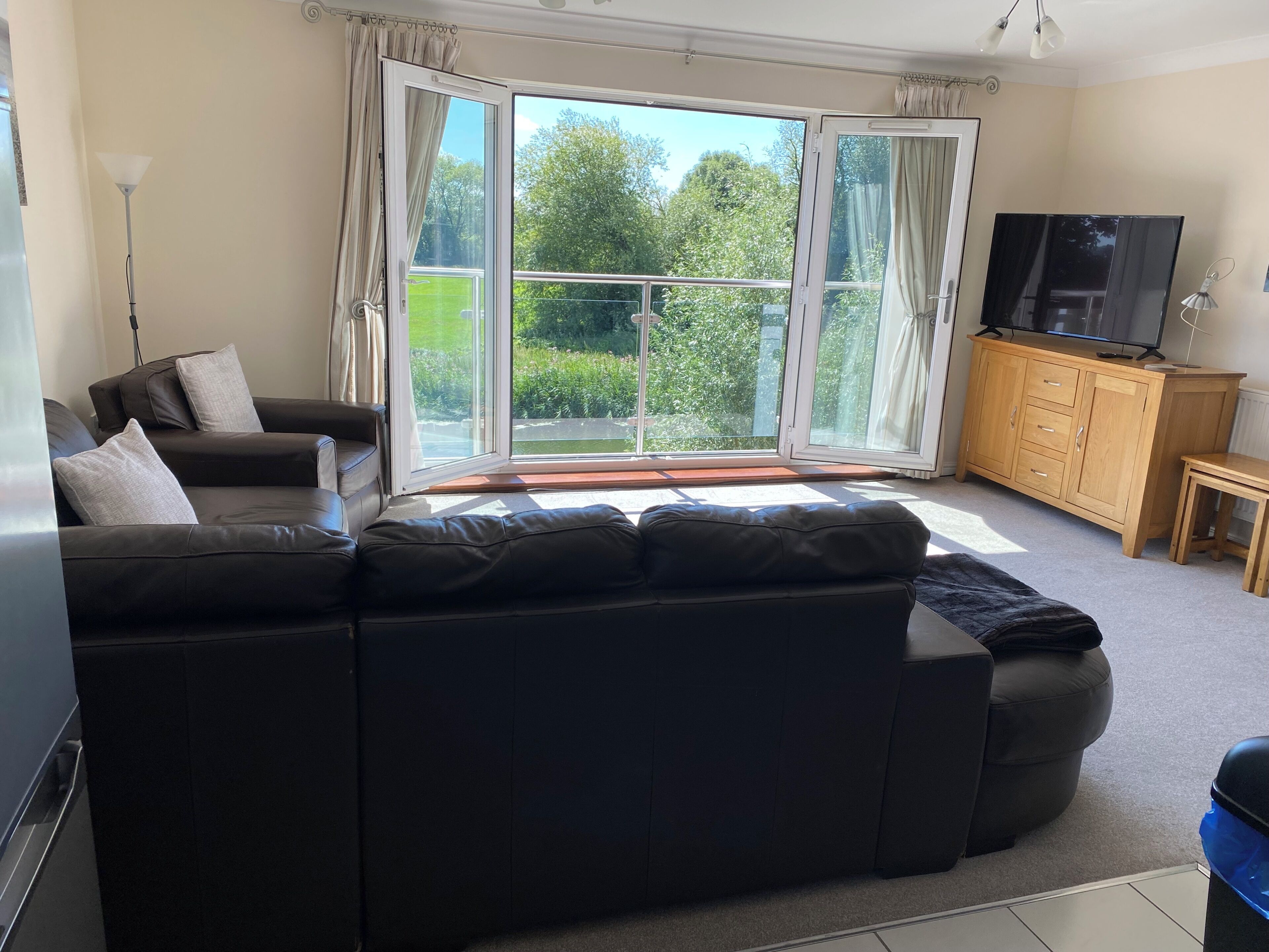 Apartment, 2 Bedrooms, River View | Living area | TV