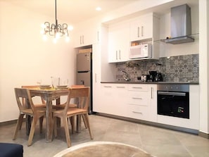 Apartment, 2 Bedrooms, Balcony, City View | Dining
