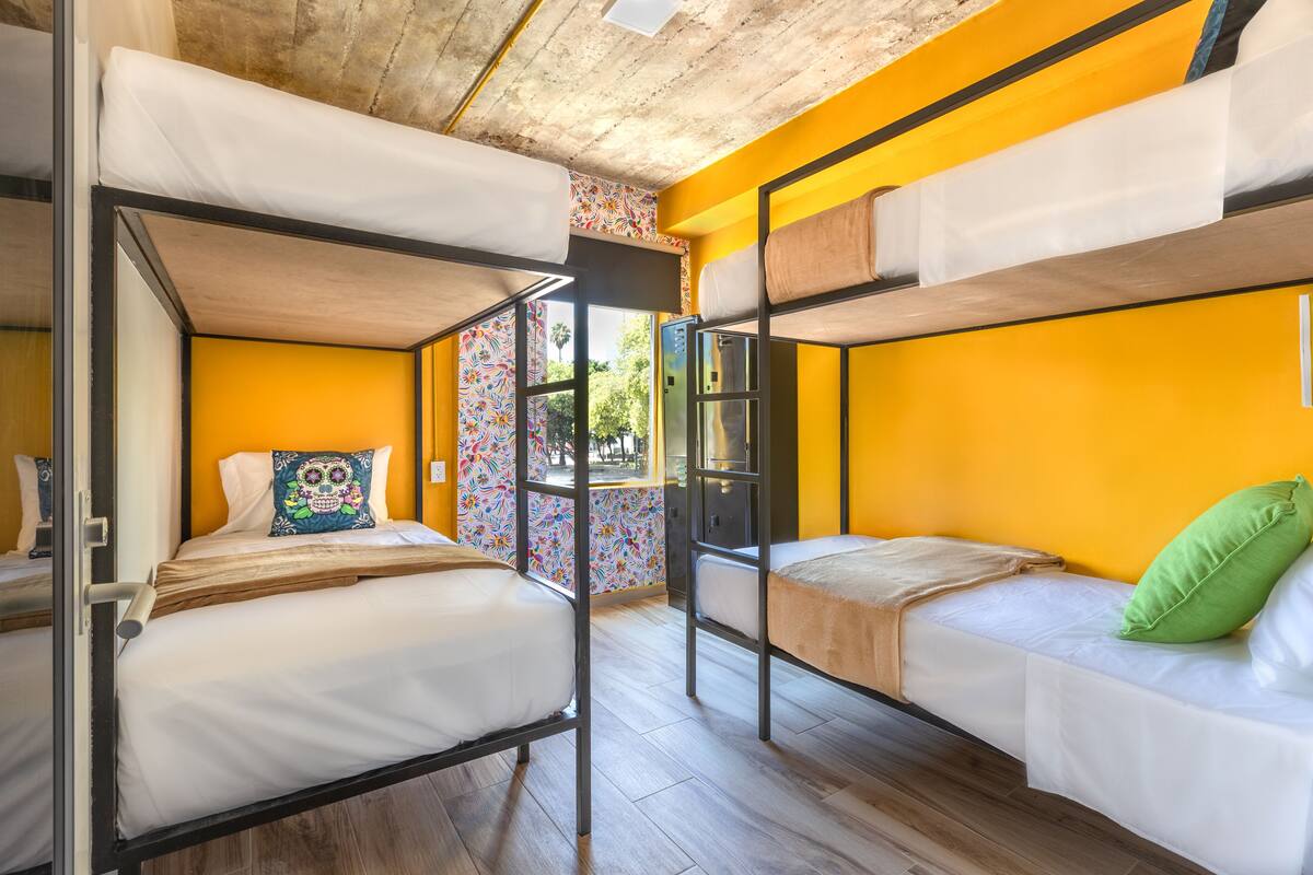 Shared Dormitory, Mixed Dorm, 2 Bunk Beds | Hypo-allergenic bedding, free WiFi, individually decorated, bed sheets