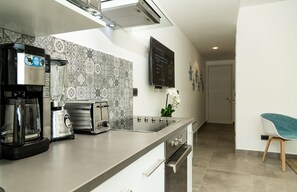 Condo, 1 Bedroom, Terrace | Private kitchen | Microwave, coffee/tea maker