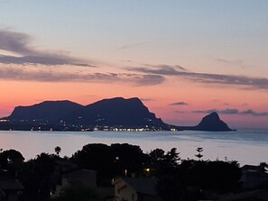 A coastal landscape with a prominent mountain and a smaller hill in the foreground. - Panoramic Villa Near The Sea (Altavilla Milicia)