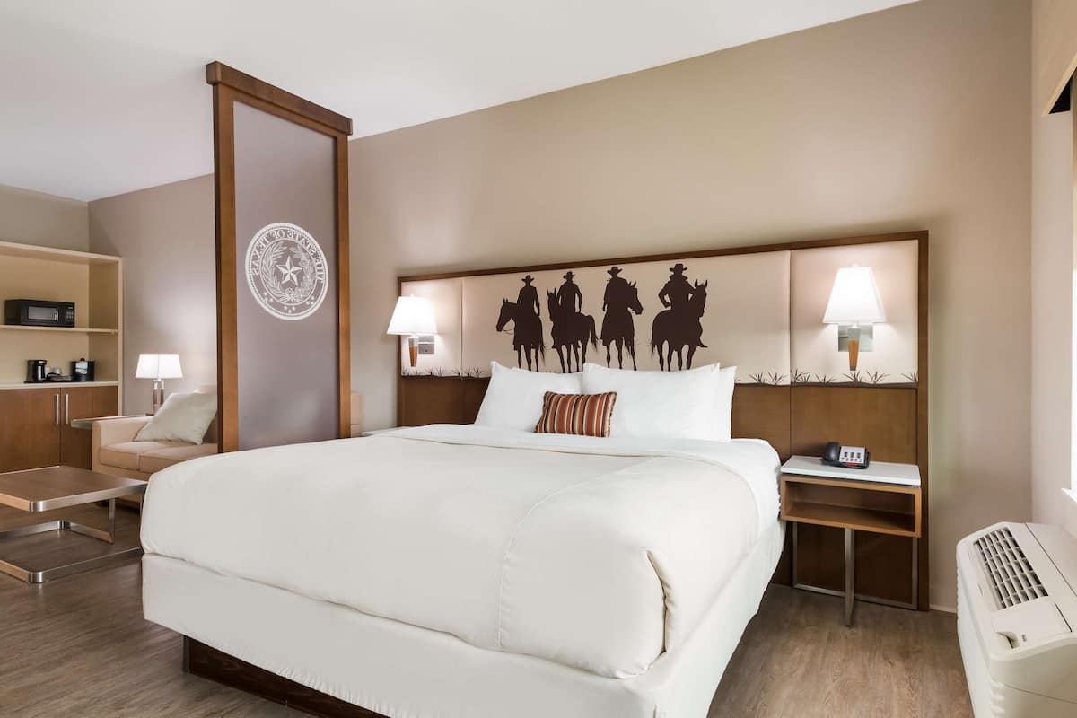 Premium bedding, desk, laptop workspace, free WiFi