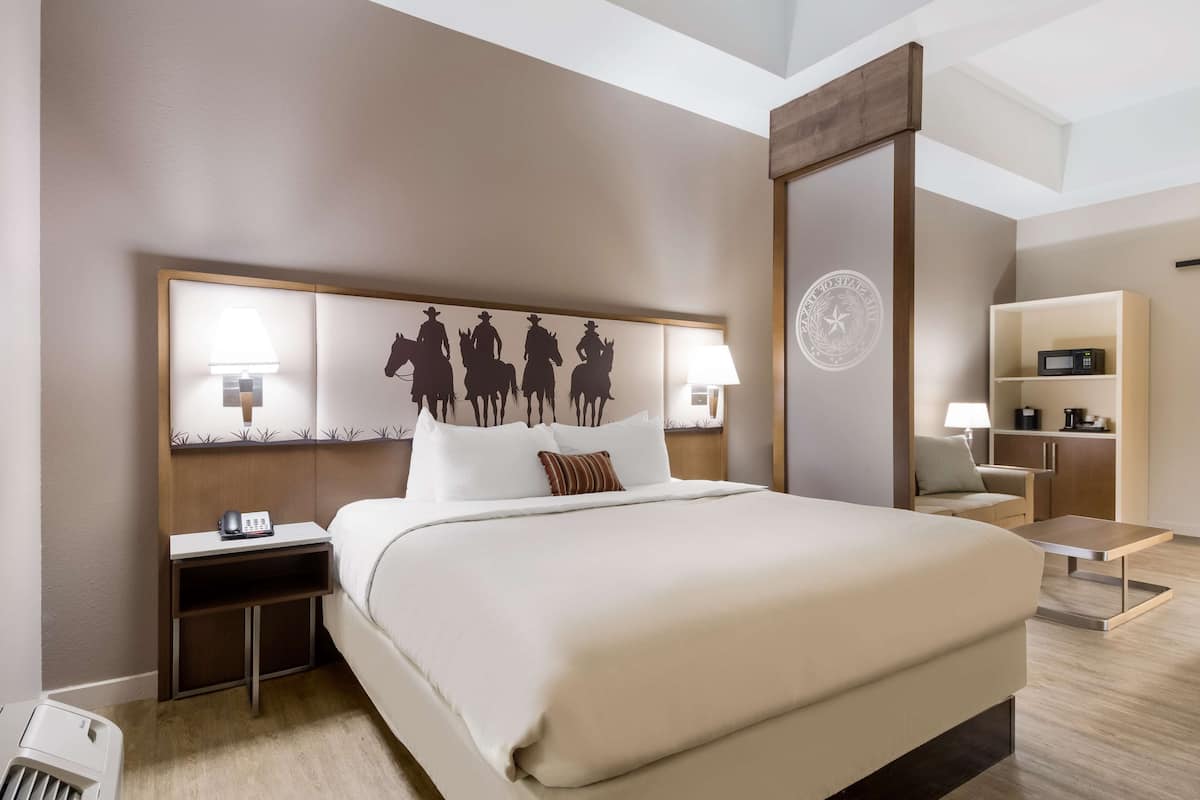 Premium bedding, desk, laptop workspace, free WiFi