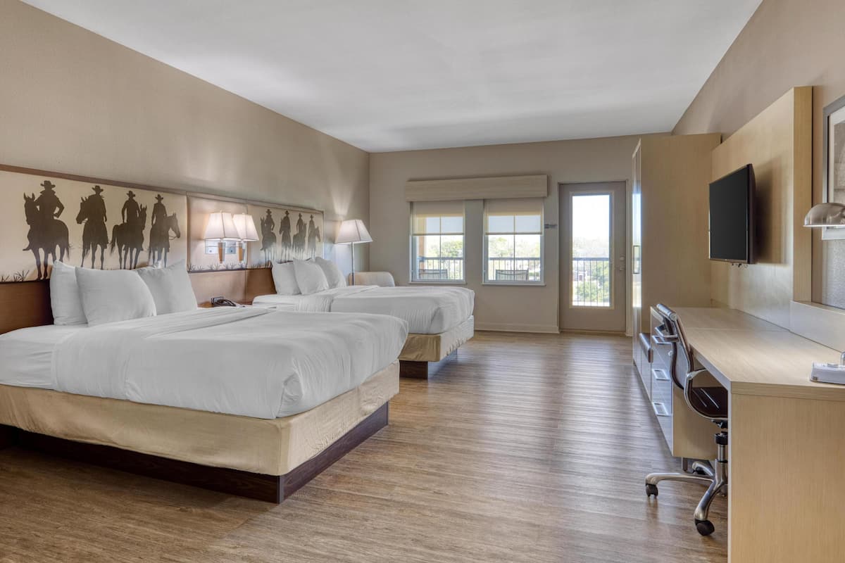 Premium bedding, desk, laptop workspace, free WiFi