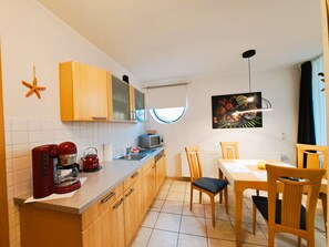 Imagen sin descripción, 5 de 15, botón