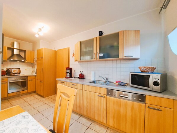 Imagen sin descripción, 1 de 15, botón