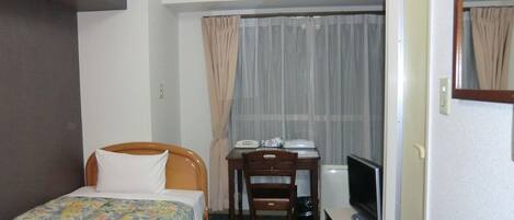 1 habitación, escritorio, wifi gratis y ropa de cama