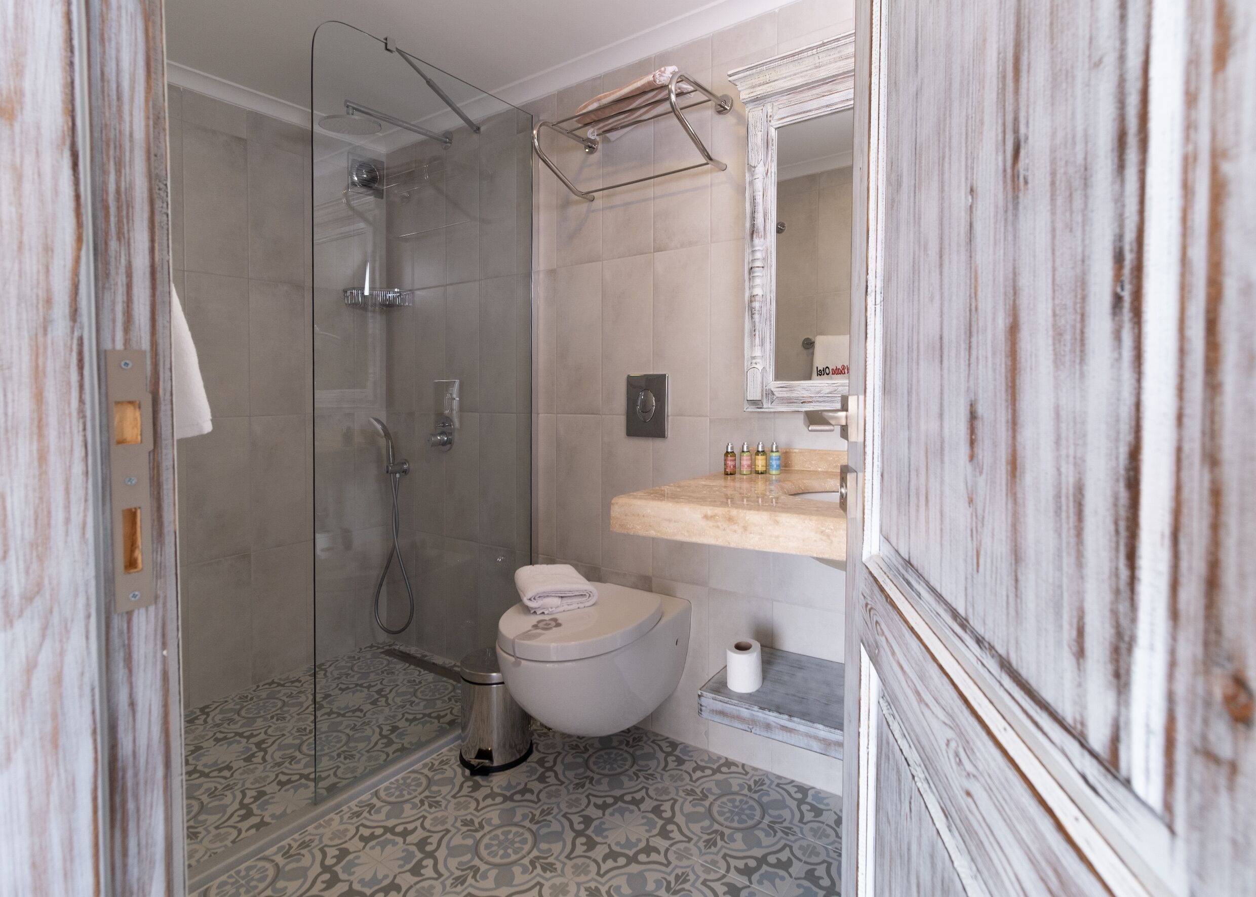 deluxe room, jetted tub, sea view | bathroom | shower, rainfall showerhead, designer toiletries, hair dryer