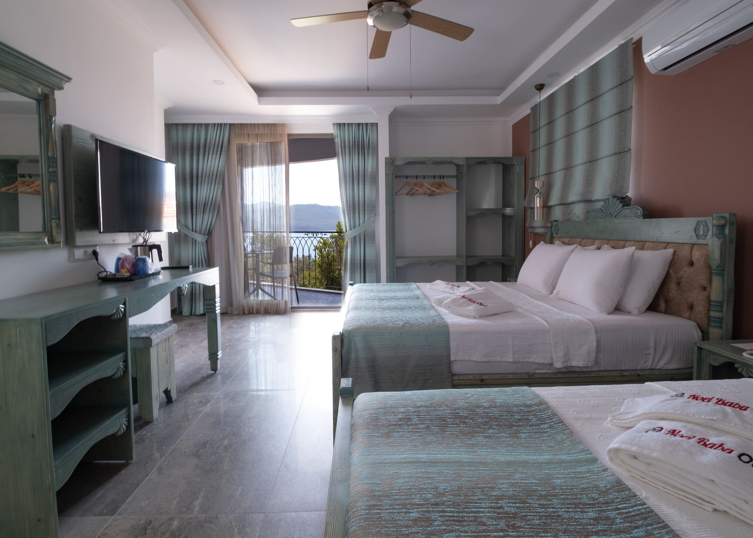 family room, sea view | premium bedding, minibar, in-room safe, blackout curtains