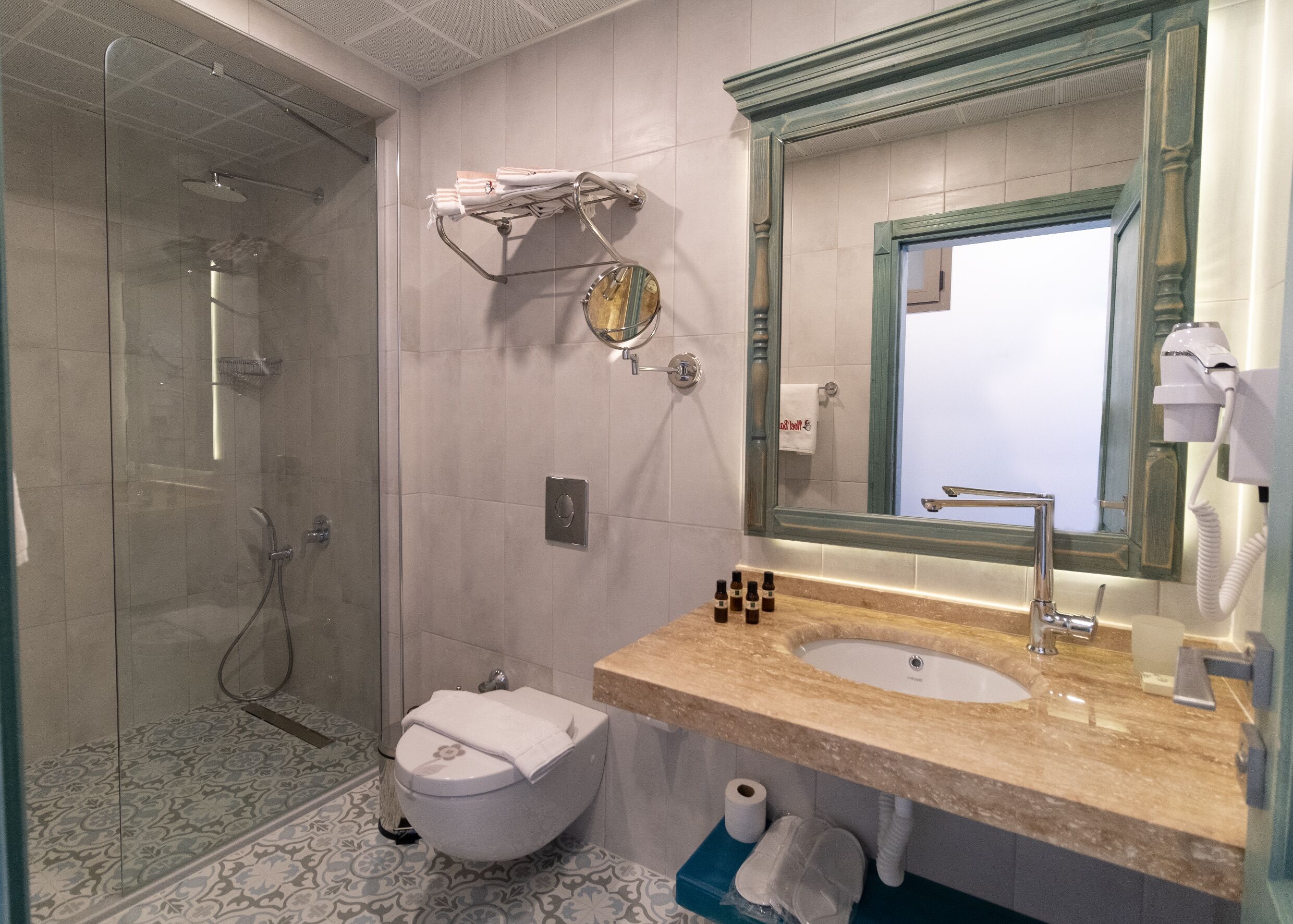 shower, rainfall showerhead, designer toiletries, hair dryer