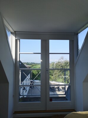 Family Room | Balcony view - MidtGolf Guest house (Regstrup)