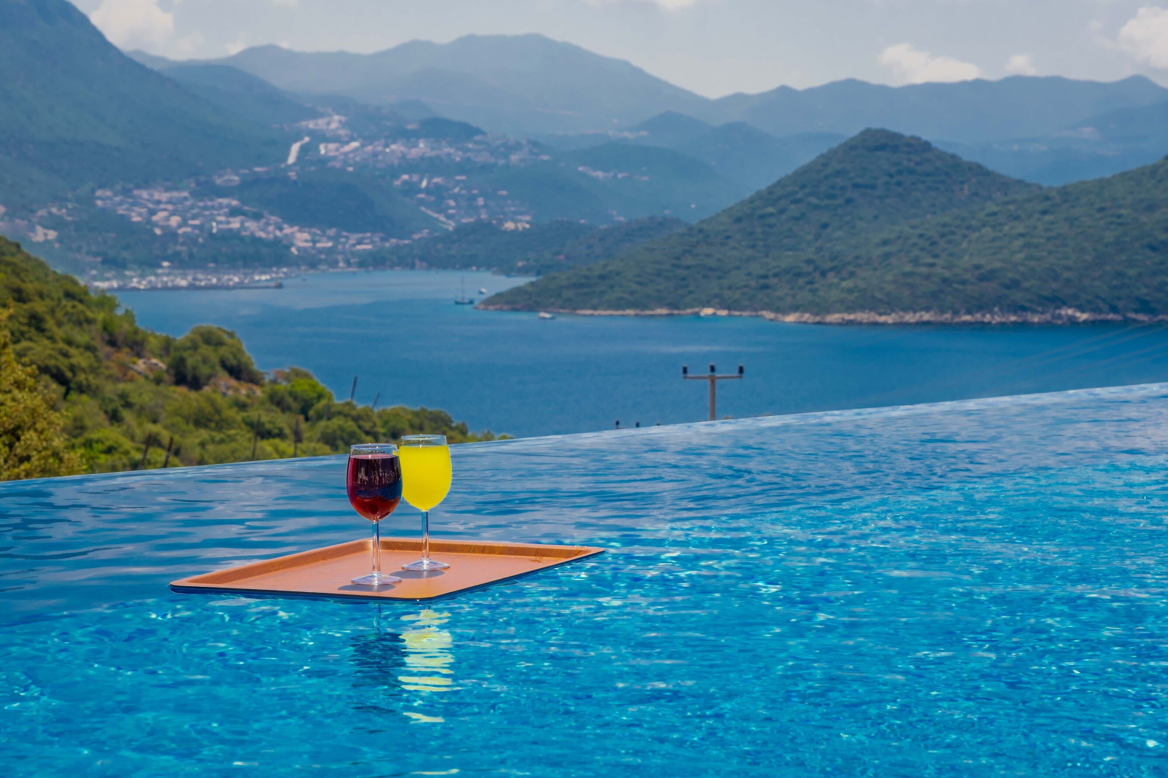 outdoor pool, open noon to 6:00 pm, pool umbrellas, pool loungers