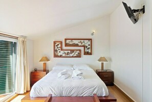 2 dormitorios, tabla de planchar con plancha, Internet y ropa de cama