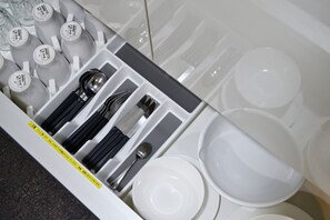 Fridge, microwave, stovetop, cookware/dishes/utensils