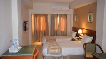 Egyptian cotton sheets, premium bedding, pillow-top beds, free minibar