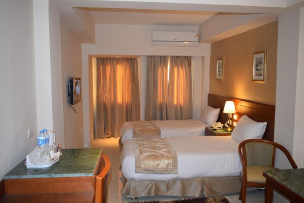 Egyptian cotton sheets, premium bedding, pillow-top beds, free minibar