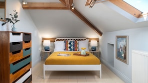 4 bedrooms, blackout drapes, iron/ironing board, travel crib