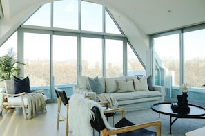 Deluxe Penthouse | Living room | 50-inch Smart TV with digital channels, TV - The Carlton Apartments (Christchurch)