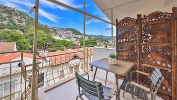 Deluxe Penthouse, 1 Queen Bed, Partial Sea View | Terrace/patio