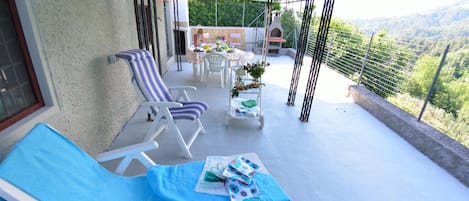 Family House, Multiple Bedrooms, Mountainside (Casale Geniva with private pool) | Outdoor dining