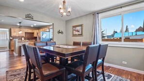 【Dining】Dining Area — Second Angle, Leather Chairs, Open to Kitchen