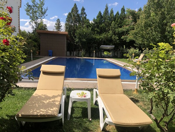 Outdoor pool, pool umbrellas, pool loungers