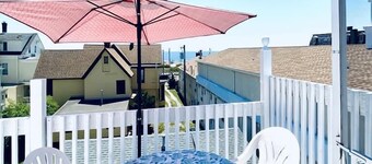 Ocean Views, seconds to the beach, and a 5 minute walk to downtown shopping!