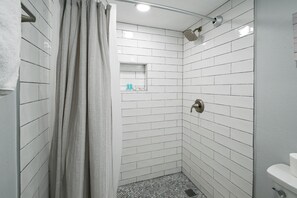 Hair dryer, towels, soap, shampoo