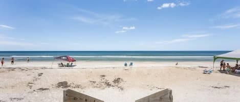 On the beach, sun-loungers, beach towels
