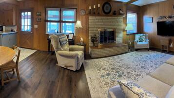 Smart TV, fireplace, books