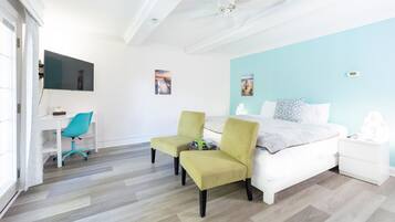 1 bedroom, desk, iron/ironing board, travel cot